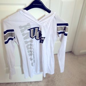 Tight fitted, long shelve shirt with a hood